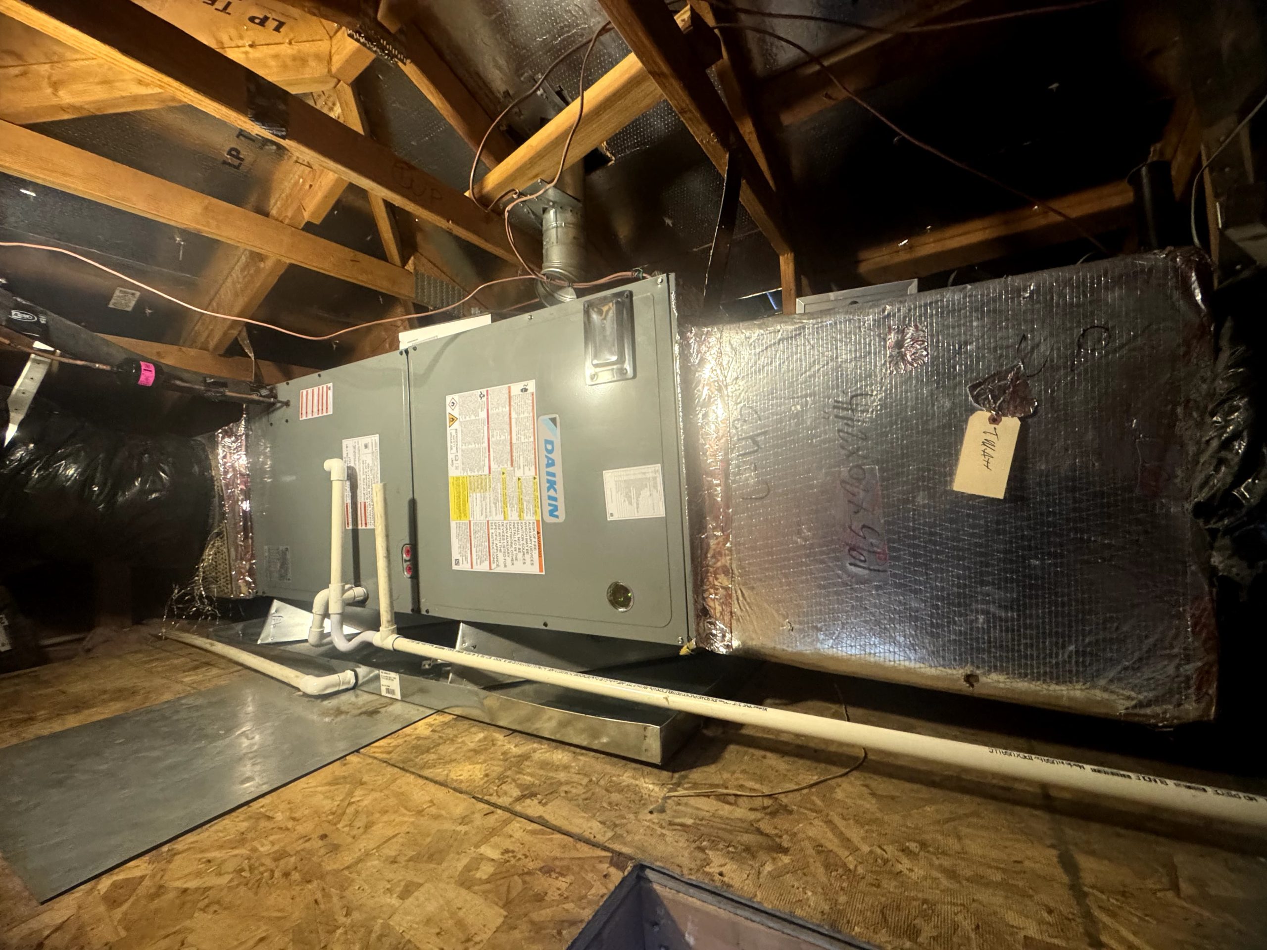 Daikin air handler and new ductwork installed in an attic by Best HVAC LA